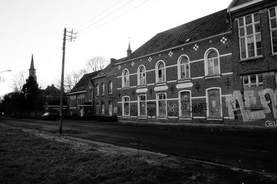 View of buildings in city against clear sky