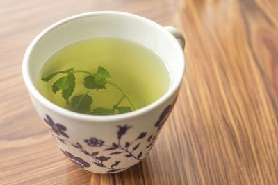 High angle view of tea in cup on table