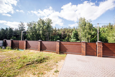 Modern fence with automatic gate