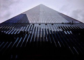 Low angle view of skyscraper against sky