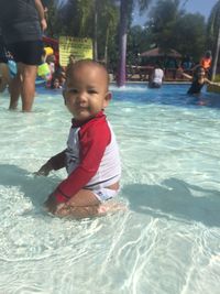 Cute boy in swimming pool