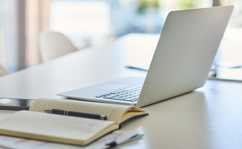 Close-up of laptop on table