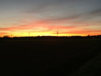 Scenic view of landscape at sunset