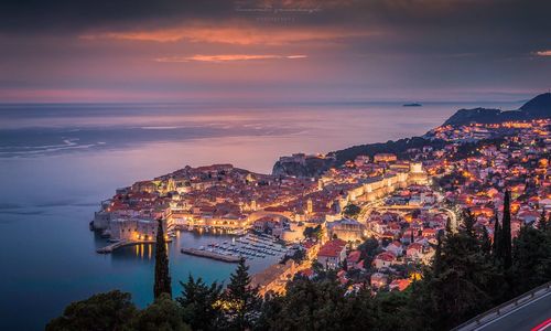 High angle view of dubrovnik lit up at sunset
