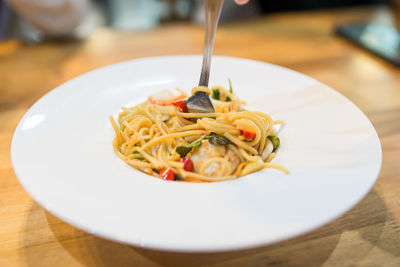 Close-up of noodles served in plate