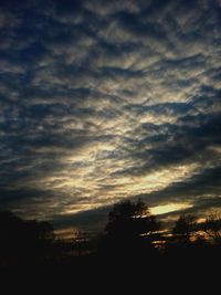 Scenic view of landscape against cloudy sky