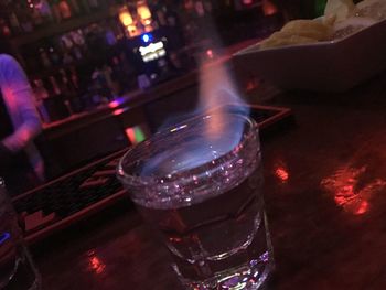 Close-up of beer glass on table