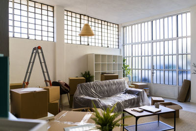 Interior of new apartment with boxes and furniture