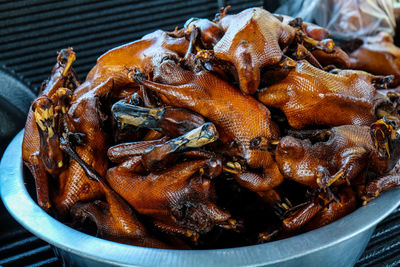 Close-up of grilled duck meat for sale at stall