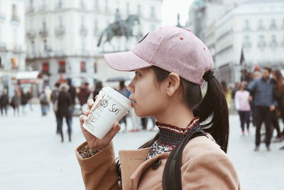 Portrait of woman wearing hat