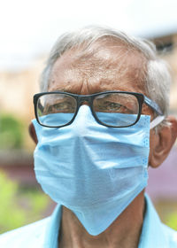 Close-up of man wearing mask