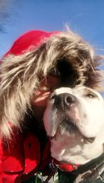 Close-up portrait of woman with dog