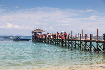 Pier over sea against sky