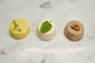 High angle view of fruits on white table