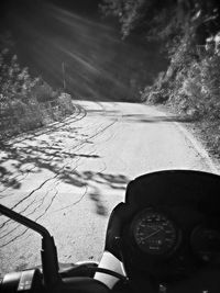 Cropped image of car on road