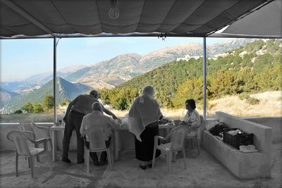 People sitting on mountain