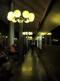 Illuminated lights in row at restaurant