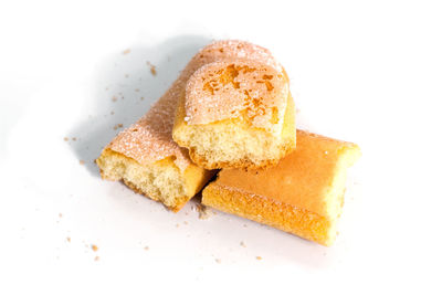 Close-up of cake against white background