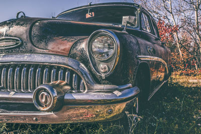 Old vintage car on field