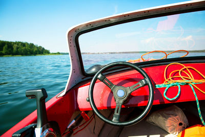 Close-up of red ship in sea