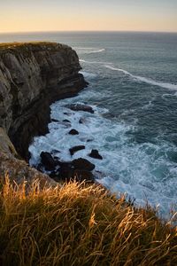 High angle view of sea against sky during sunset