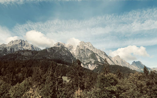 Scenic view of snowcapped mountains against sky