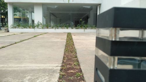 Sidewalk by building in city