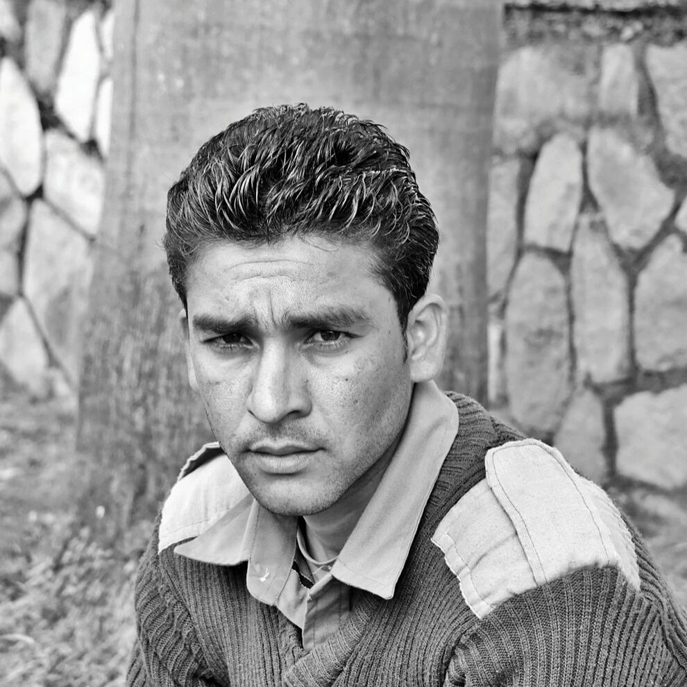 CLOSE-UP PORTRAIT OF A MAN IN A ROW