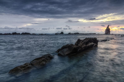 Scenic view of sea against sky during sunset