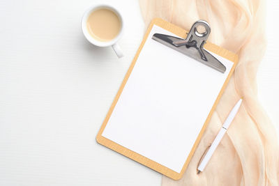 High angle view of coffee cup on table