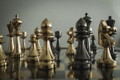 Close-up of chess pieces on table