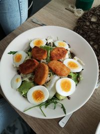 High angle view of breakfast served on table