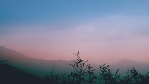 Scenic view of landscape against sky during sunset