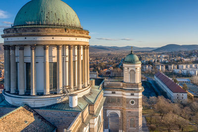 Panoramic view of buildings in city against clear sky