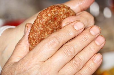 Close-up of man holding ice cream