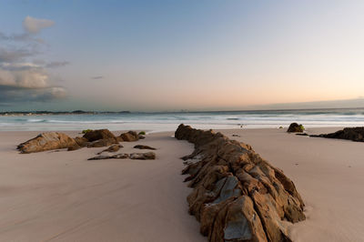 Scenic view of sea against sky at sunset