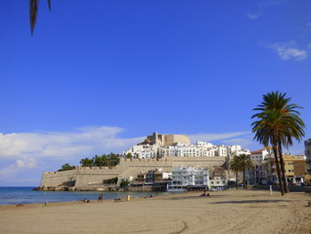 Distant view of castillo de peniscola against sky