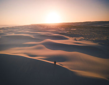 Scenic view of landscape against sky during sunset