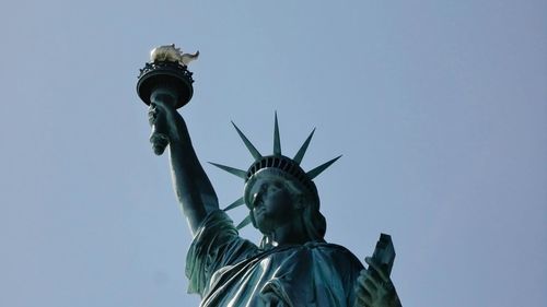 Low angle view of statue against clear sky