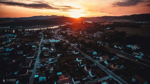 High angle view of cityscape against sky during sunset