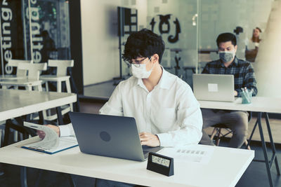 Men working on table