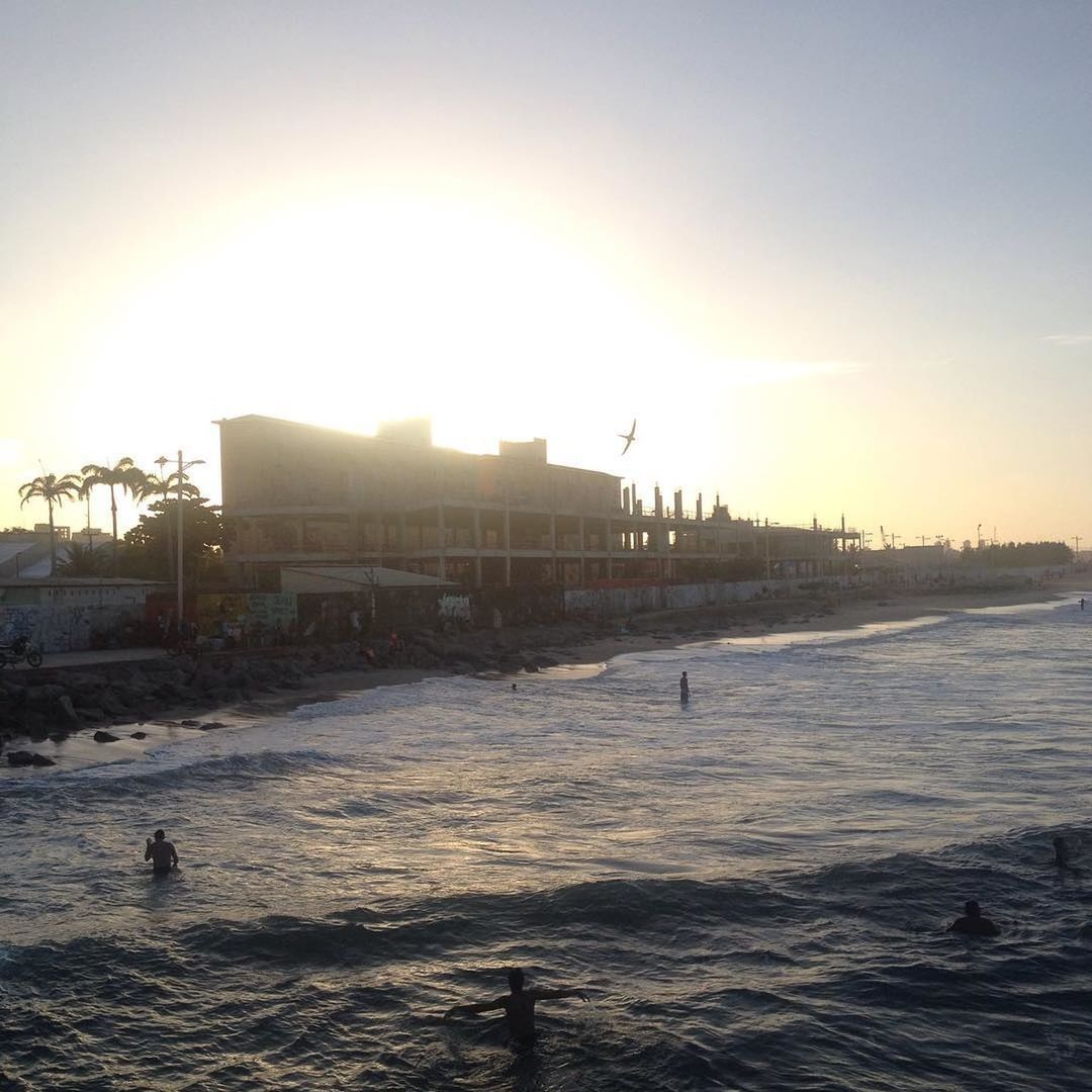 VIEW OF SEA AGAINST SKY AT SUNSET