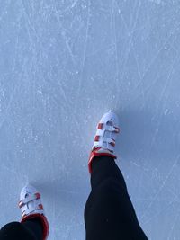 Human foot slipping through ice