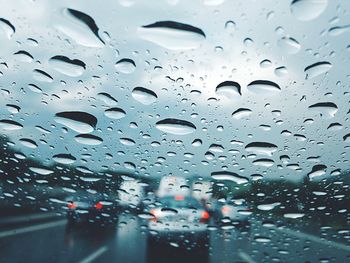 Close-up of water drops on glass