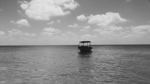 Boat sailing in sea