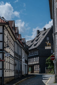 Buildings in city against sky