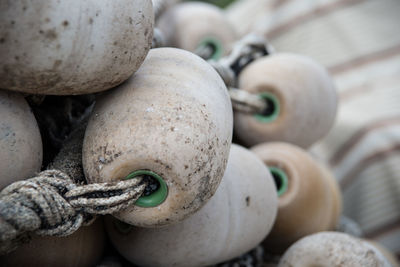 Close-up of ropes and buoys