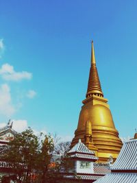 Low angle view of temple against clear blue sky