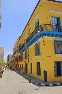 Residential buildings against sky in city