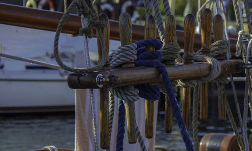 Close-up of rope tied on bollard